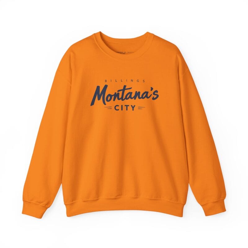 Orange sweatshirt with 'Montana's City' design.